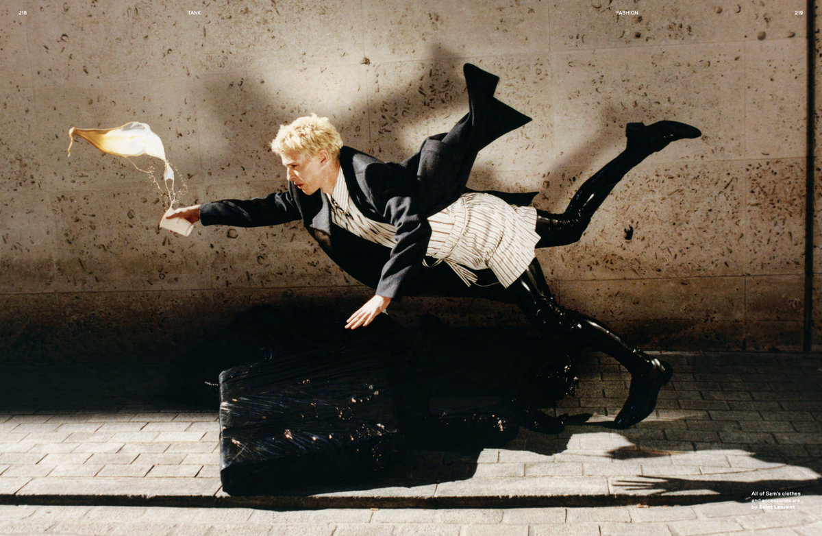 TANK 108 Autumn 2026, fashion spread showing a person leaping with a cup